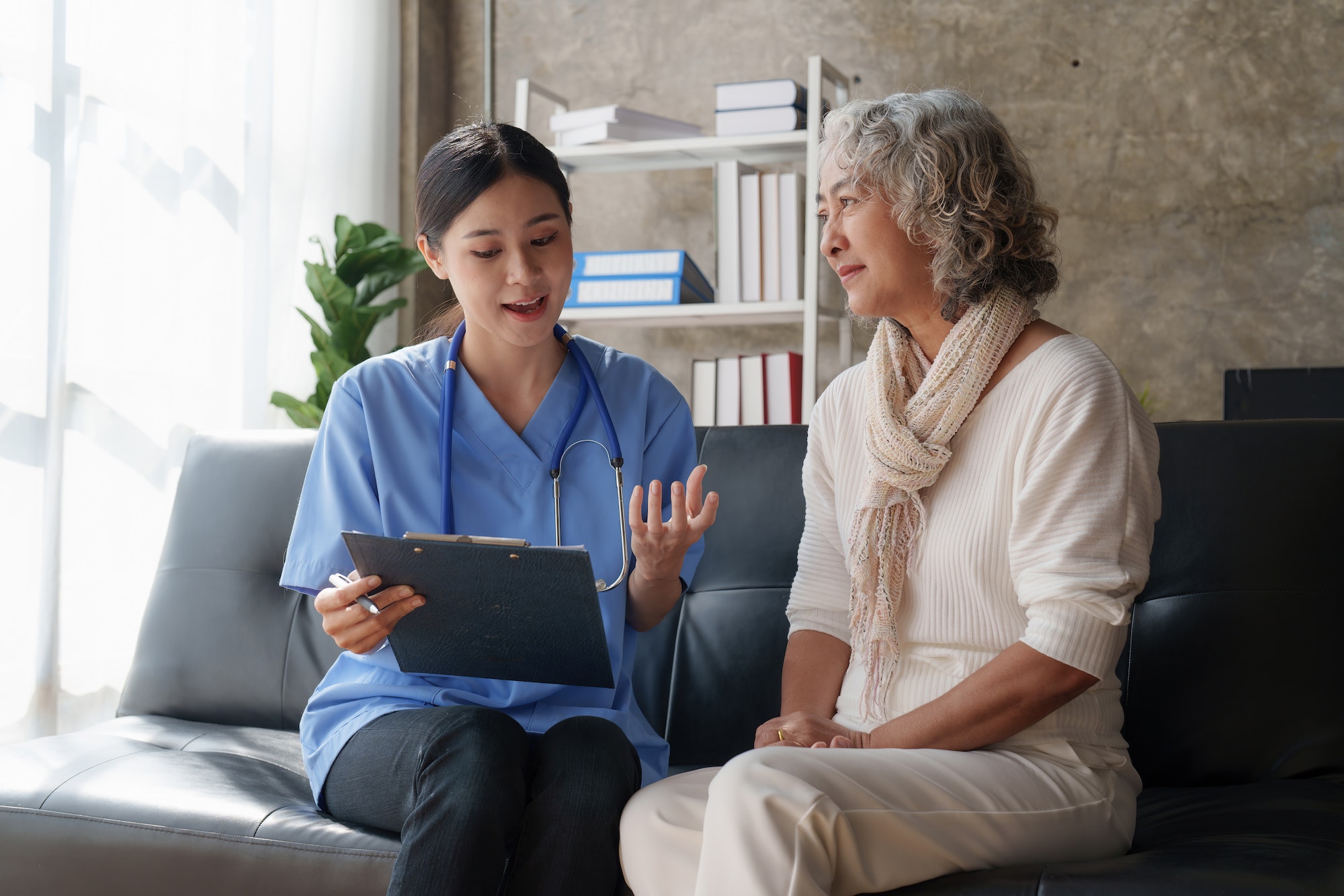 home-healthcare-nurse-physical-therapy-with-senior-adult-woman-at-home.jpg